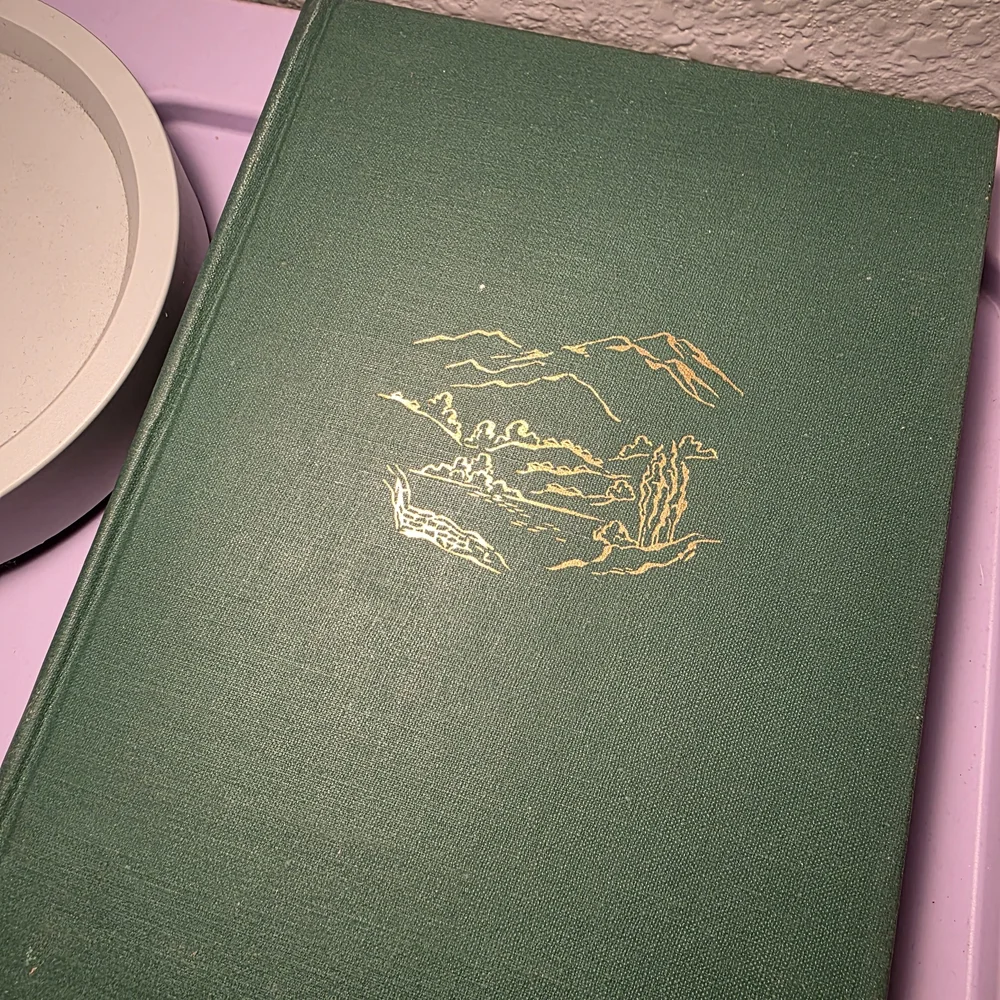 Green Hardcover Book with Gold Design